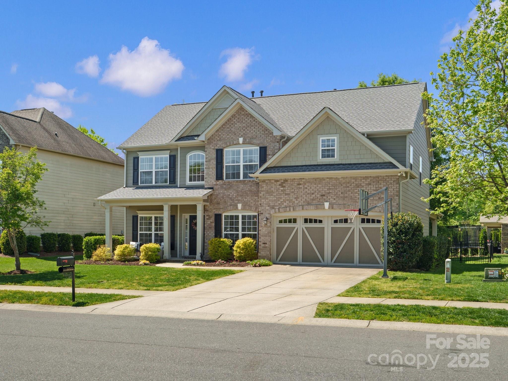 2002 Potomac Road Indian Trail, NC 28079 - Photo 2 of 43 a front view of a house with a yard