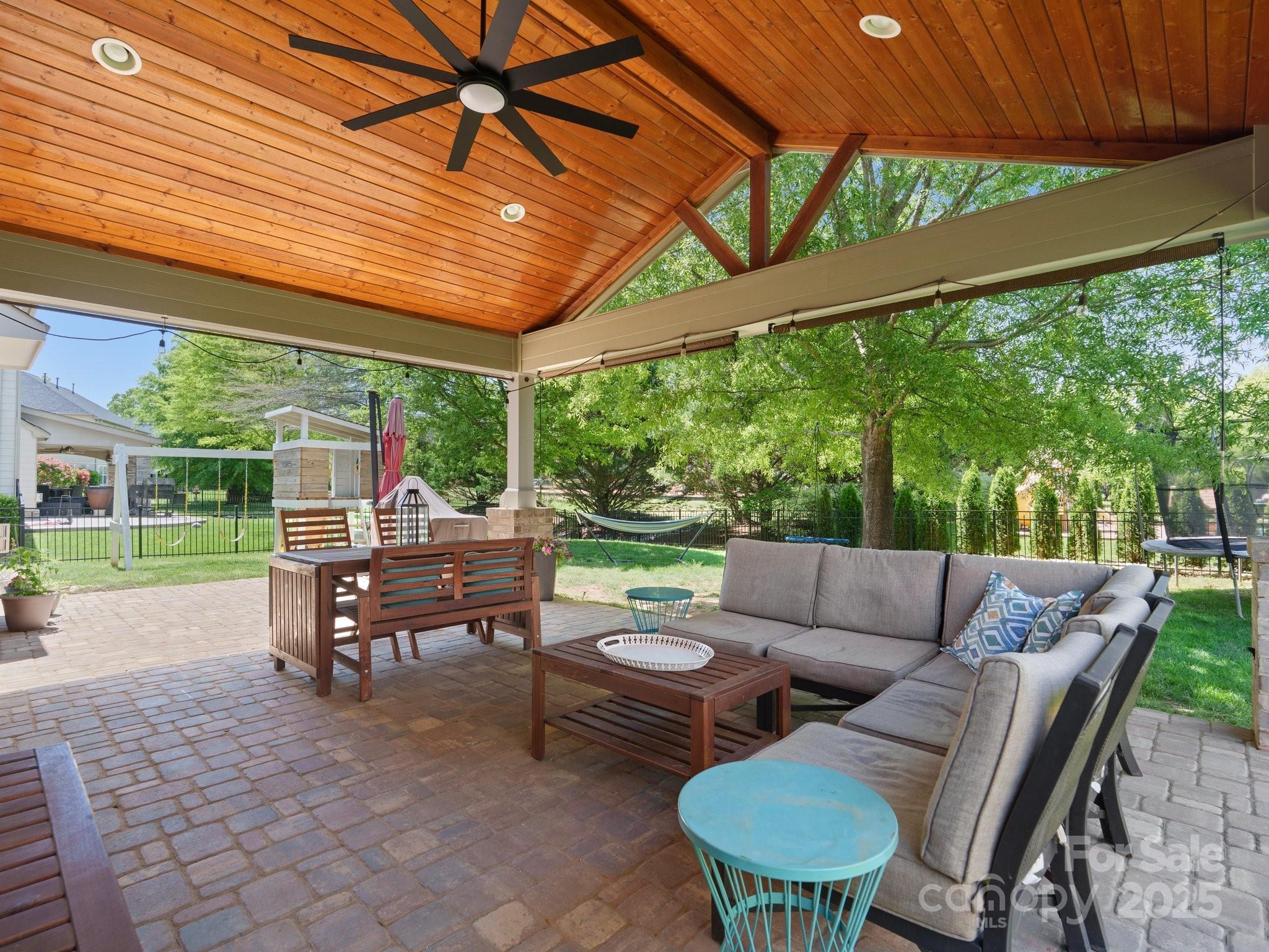 2002 Potomac Road Indian Trail, NC 28079 - Photo 42 of 43 a outdoor living space with patio furniture and garden view