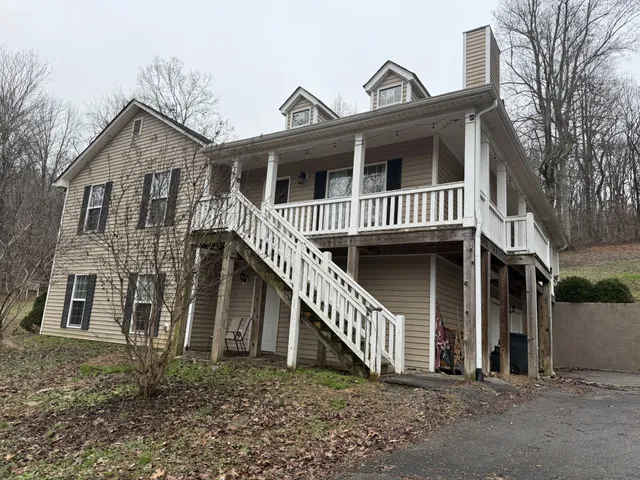front view of a house with a deck