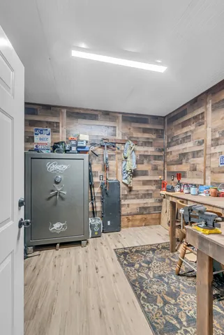 a view of a livingroom with furniture nad wooden floor