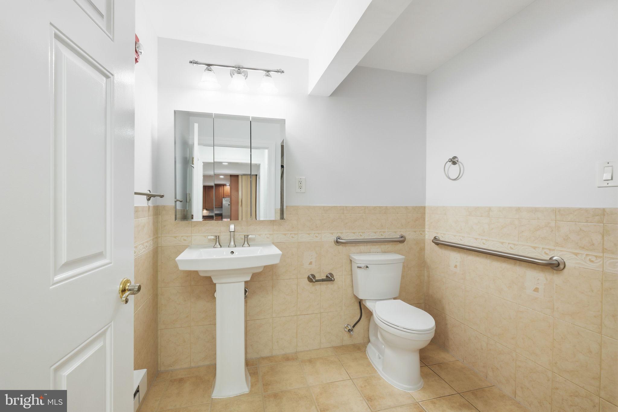 711 Lamberton Drive Silver Spring, MD 20902 - Photo 23 of 60 Main Level Full Bathroom