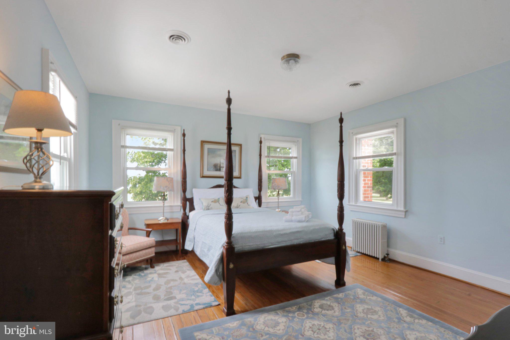 2598 Cherrystone Road Cape Charles, VA 23310 - Photo 35 of 47 Serene blue-hued bedroom retreat.