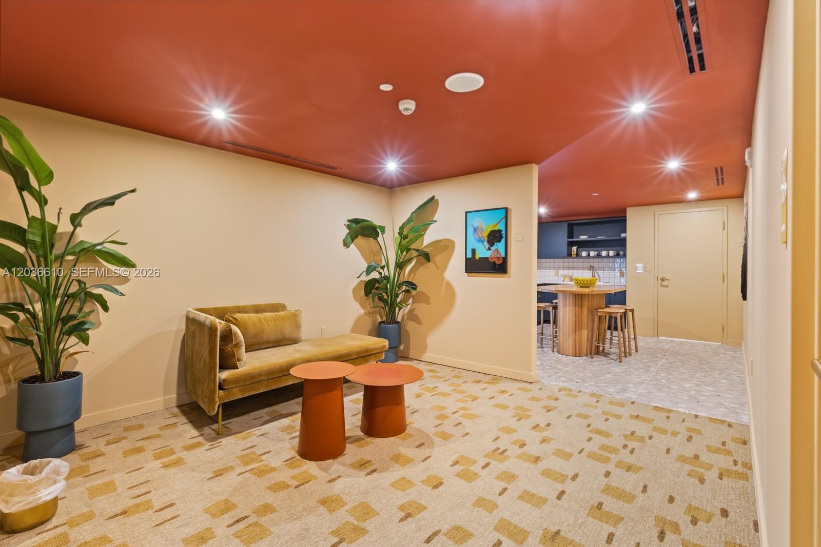 90 Northeast 32nd Street, Unit 1014 Miami, FL 33127 - Photo 18 of 39 a lobby with furniture and a potted plant