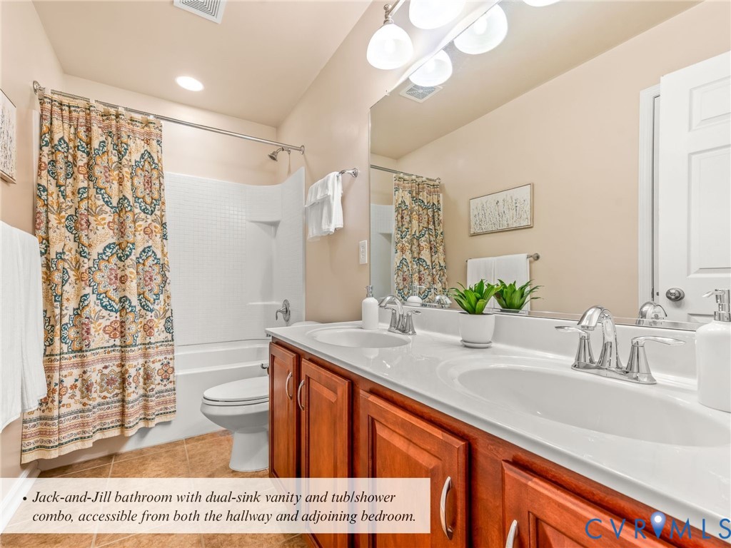 4101 Water Overlook Boulevard Midlothian, VA 23112 - Photo 29 of 50 a bathroom with a sink a mirror and a shower