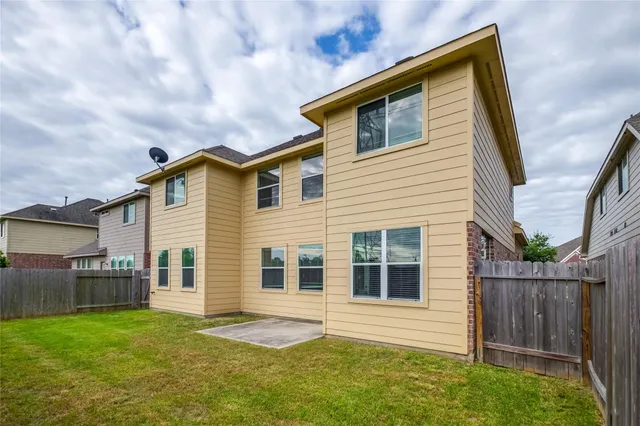 a view of house that has garden