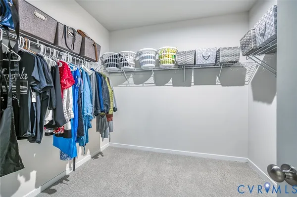 a bedroom with a bed and closet