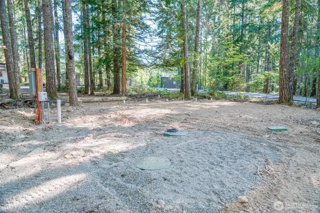 a view of outdoor space with deck and yard