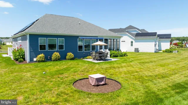 a aerial view of a house with a swimming pool