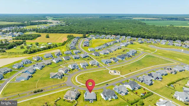 a view of a sign board with a yard