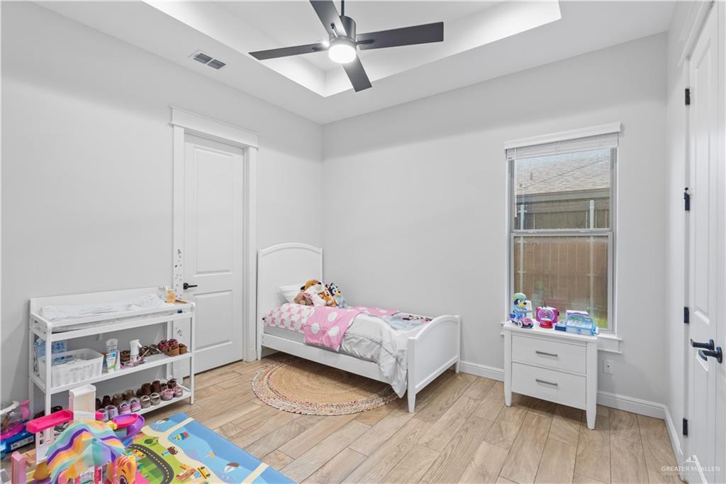 2504 Tulip Street Mission, TX 78574 - Photo 18 of 26 a bedroom with a bed and a window