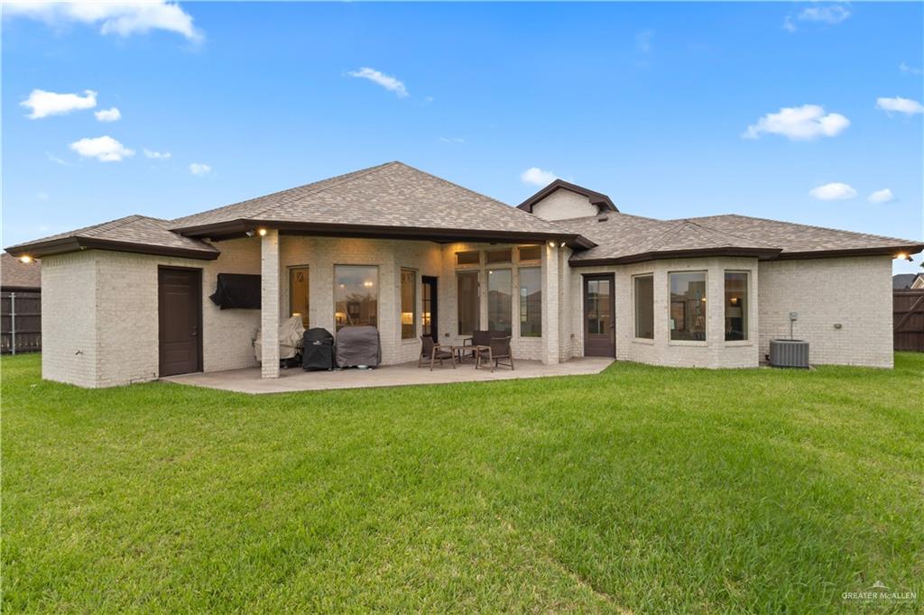 2504 Tulip Street Mission, TX 78574 - Photo 23 of 26 a view of a house with a yard and porch