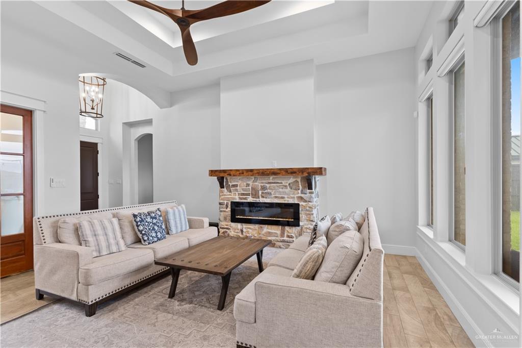 2504 Tulip Street Mission, TX 78574 - Photo 4 of 26 a living room with furniture and a fireplace
