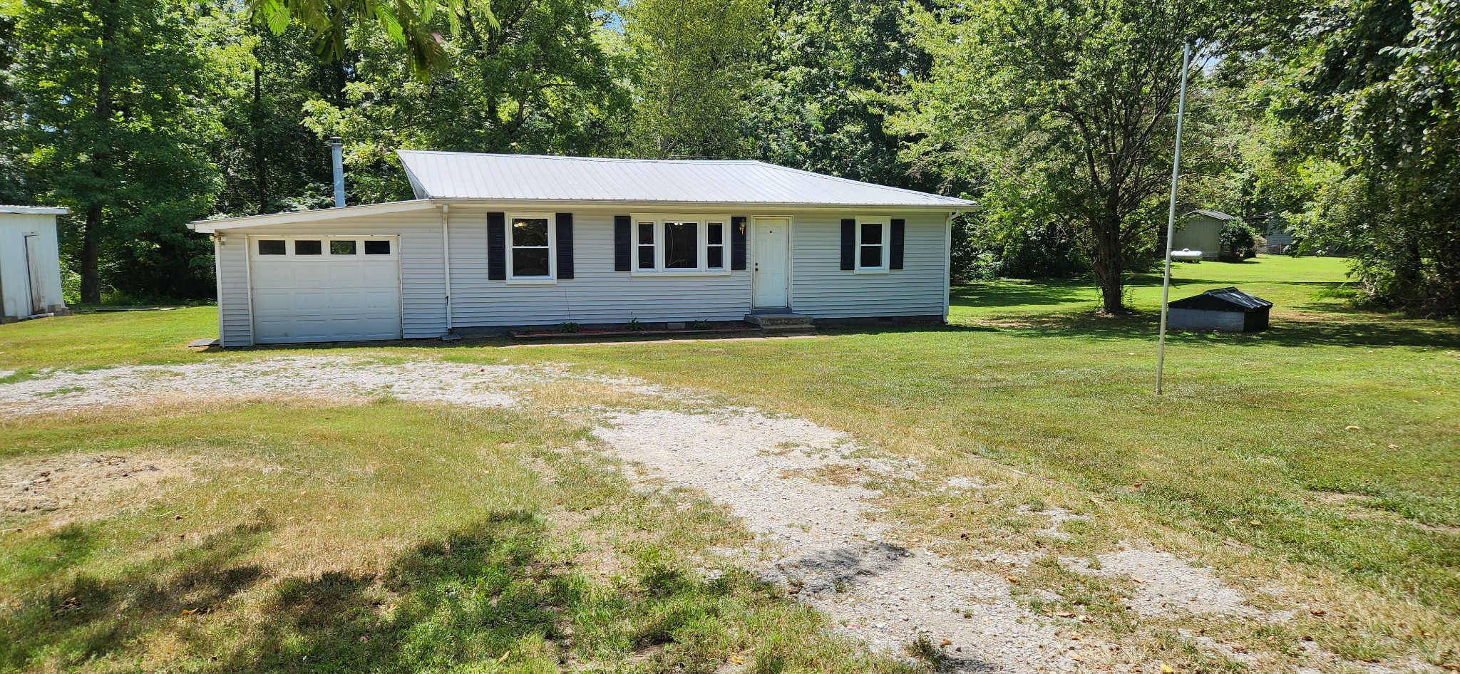 259 Brushy Road Centerville, TN 37033 - Photo 3 of 17 Front of house with side yard to your right.