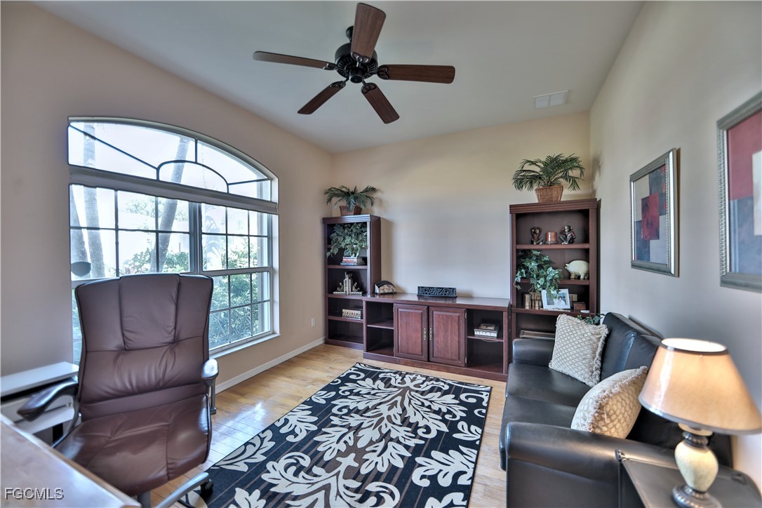 15022 Balmoral Loop Fort Myers, FL 33919 - Photo 20 of 27 a living room with furniture