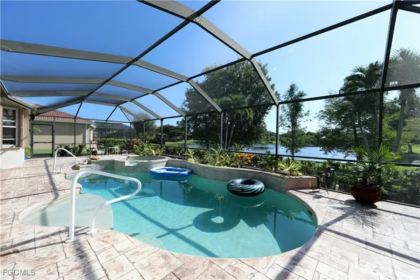 a view of a swimming pool with a patio