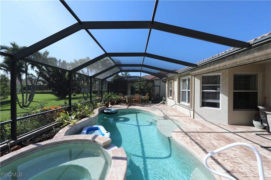 15022 Balmoral Loop Fort Myers, FL 33919 - Photo 5 of 27 a view of swimming pool with seating area and furniture
