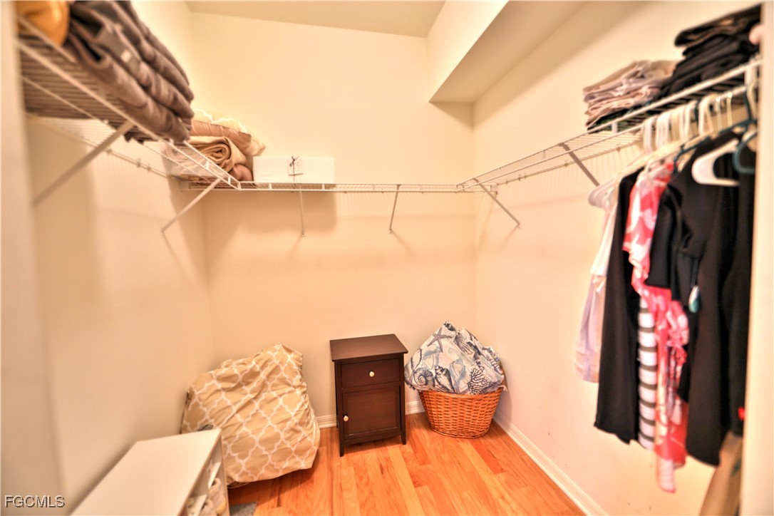 15022 Balmoral Loop Fort Myers, FL 33919 - Photo 10 of 27 a view of a balcony with chairs and potted plants
