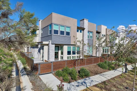 a view of a building with a yard