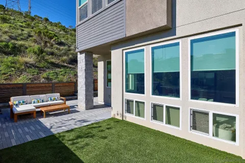 a backyard of a house with seating space