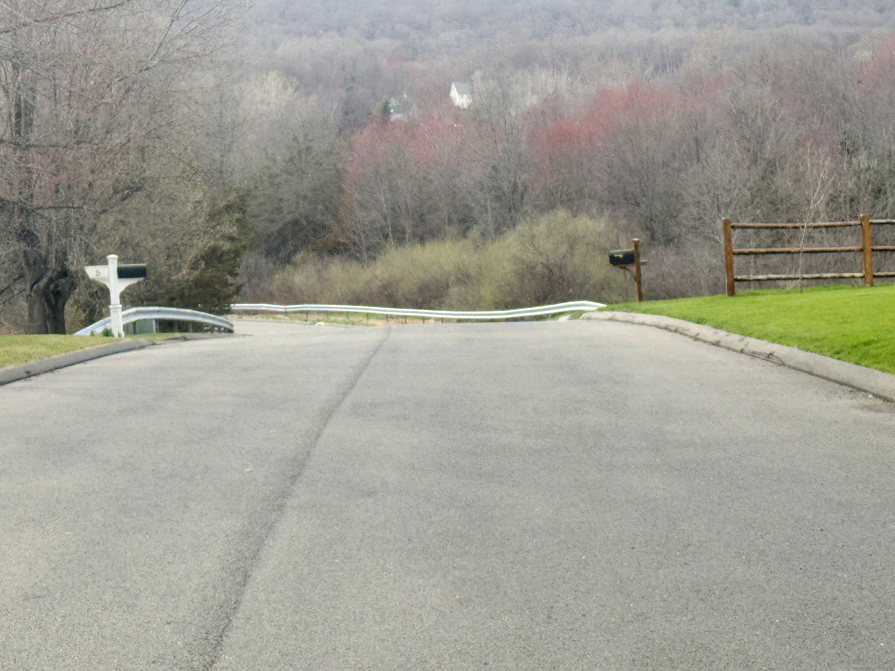 39 Ridge Boulevard East Granby, CT 06026 - Photo 3 of 8 a view of a terrace with a yard