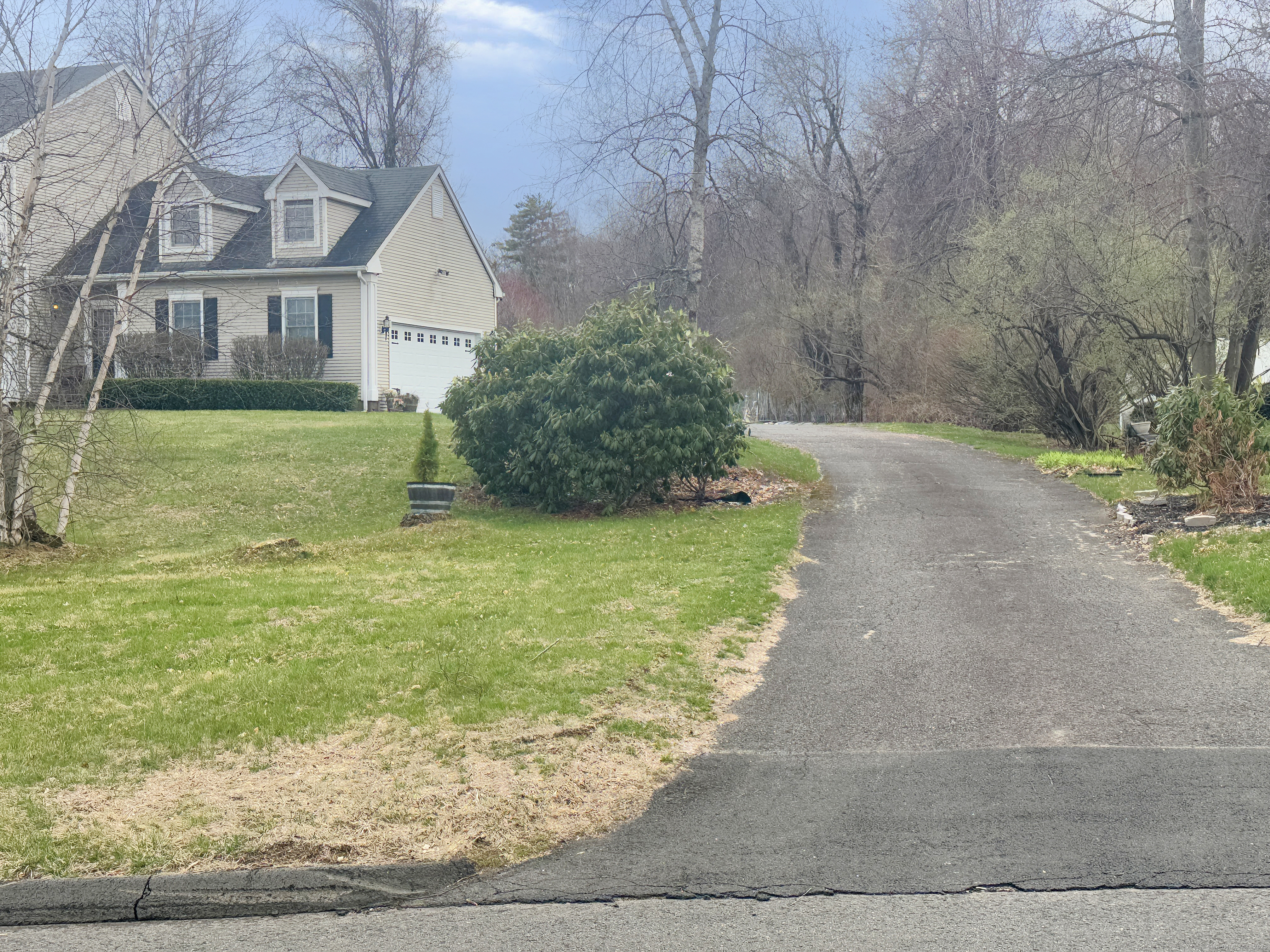 39 Ridge Boulevard East Granby, CT 06026 - Photo 7 of 8 a view of a yard in front of a house