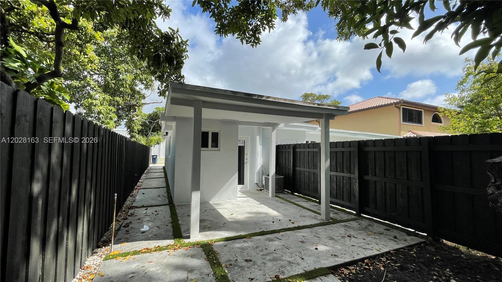 4290 Southwest 9th Street, Unit B Miami, FL 33134 - Photo 4 of 18 a view of a house with a balcony