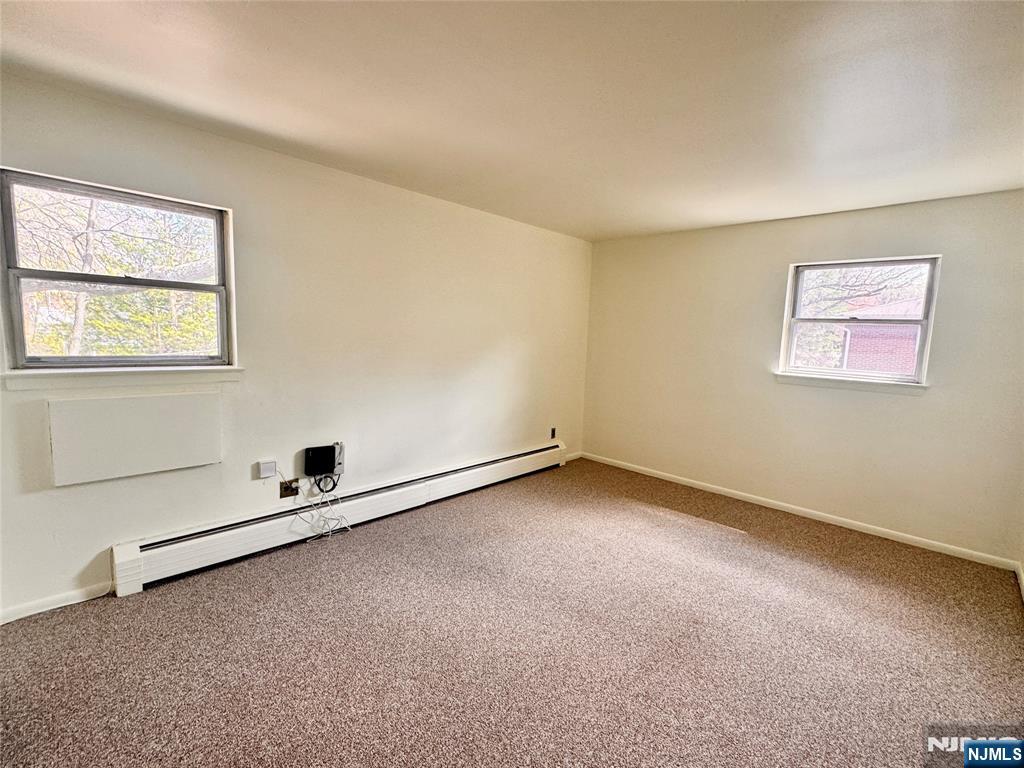 401 West Madison Avenue, Unit 7 Dumont, NJ 07628 - Photo 12 of 15 a view of a room with window