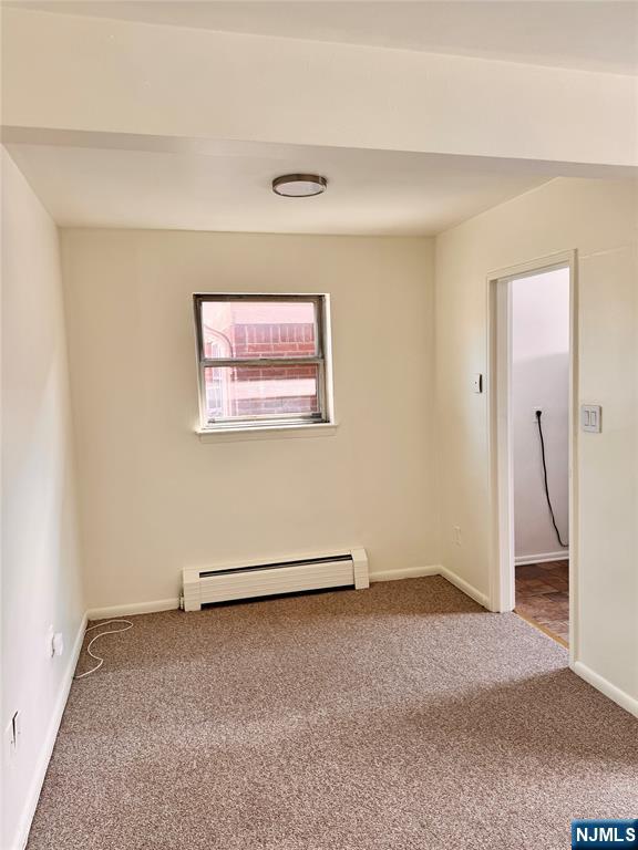 401 West Madison Avenue, Unit 7 Dumont, NJ 07628 - Photo 9 of 15 a view of a room with drop ceiling
