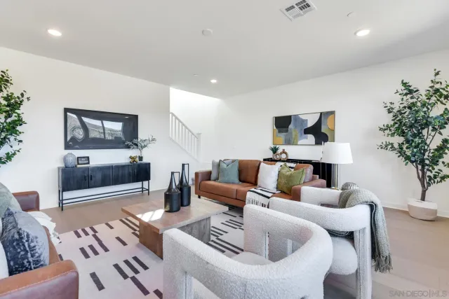 a living room with furniture and a couch