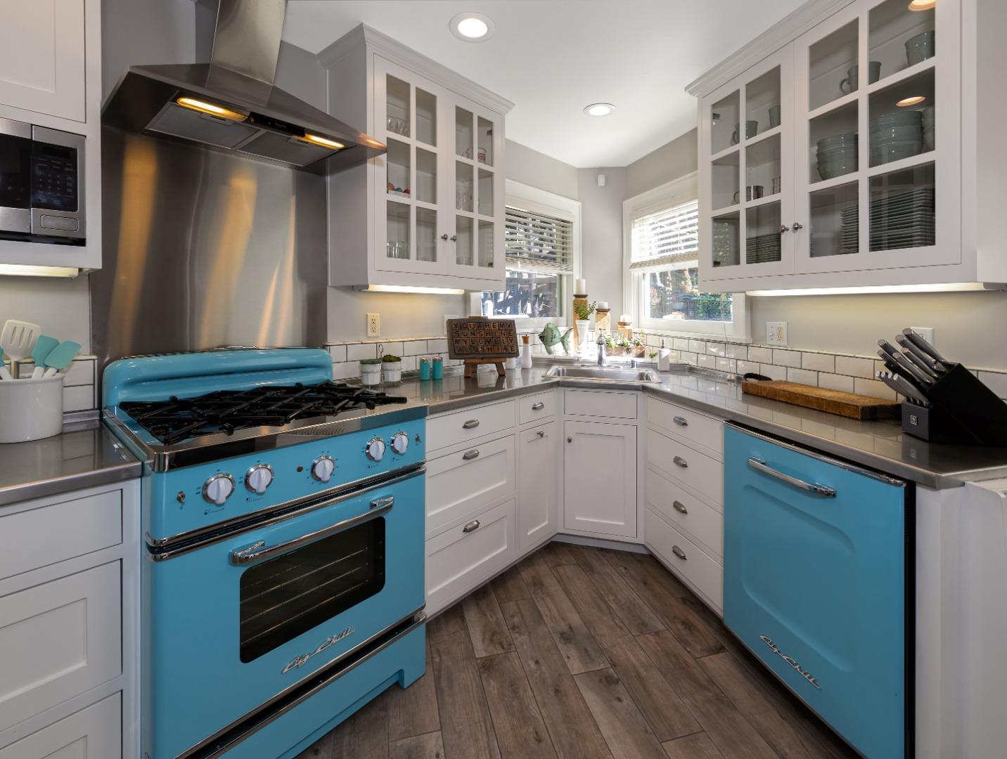 402 Riverview Avenue Capitola, CA 95010 - Photo 4 of 19 a kitchen with granite countertop cabinets stainless steel appliances and a sink