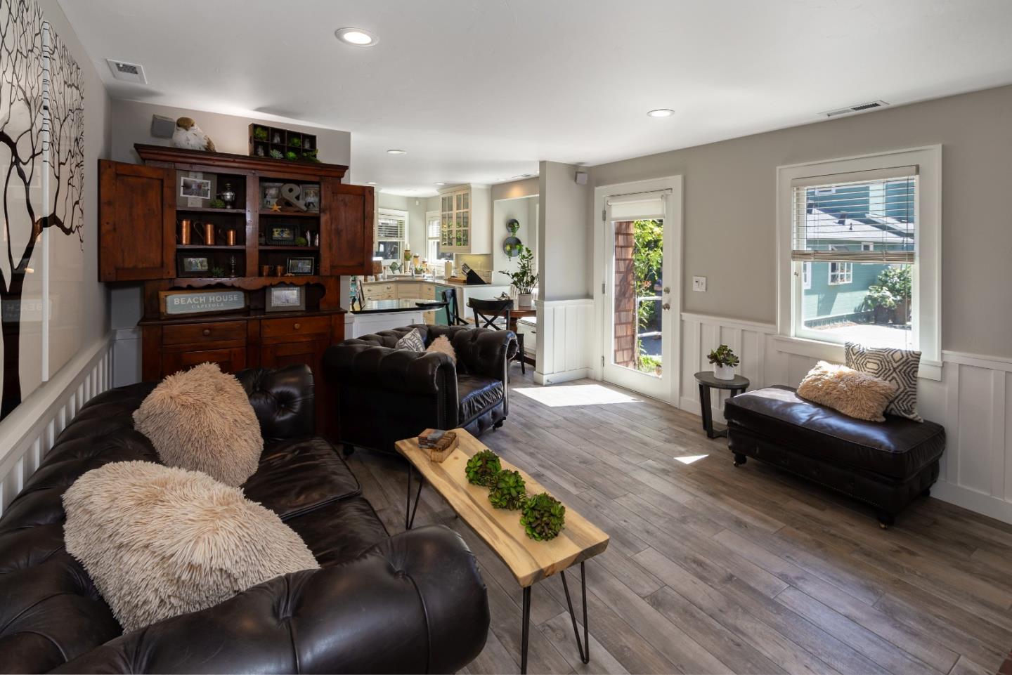 402 Riverview Avenue Capitola, CA 95010 - Photo 7 of 19 a living room with furniture and a wooden floor