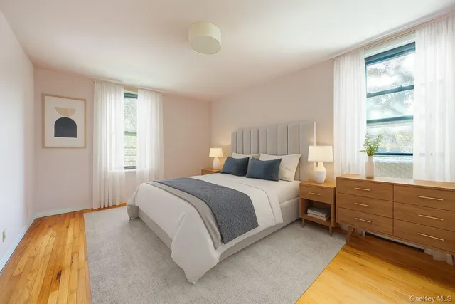 a bed room with a bed and a window