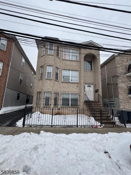 503 15th Avenue Newark, NJ 07103 - Photo 5 of 7 a front view of a house with a outdoor space