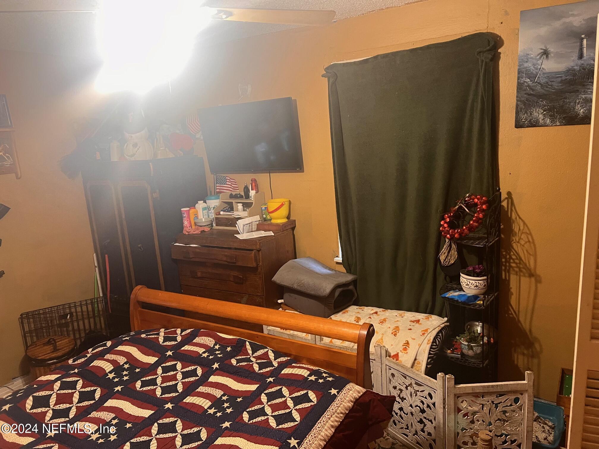 4203 Spring Park Road Jacksonville, FL 32207 - Photo 19 of 19 a bed room with a bed
