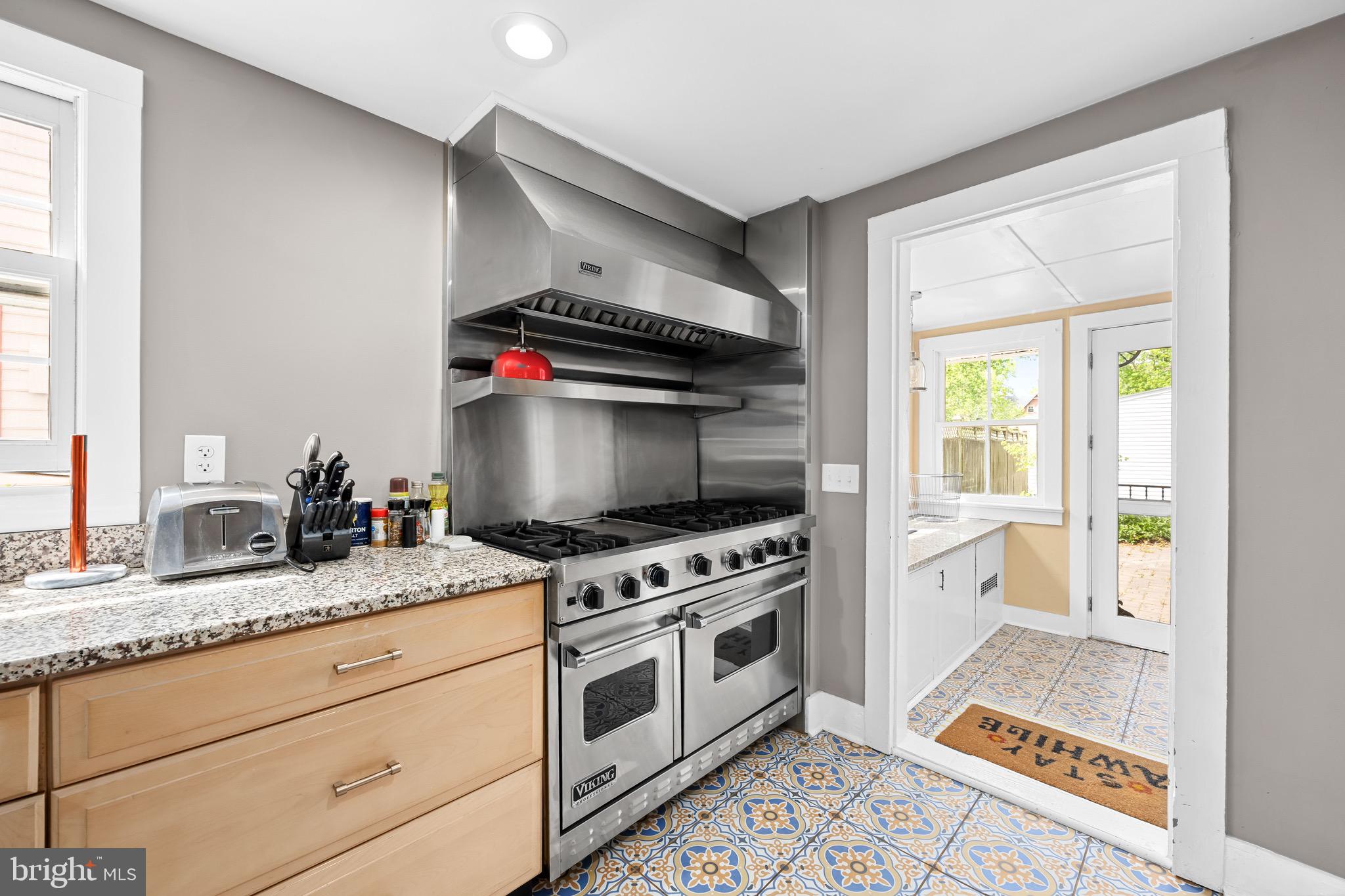 2712 Cinder Lane Quantico, MD 21856 - Photo 12 of 100 a kitchen with stainless steel appliances granite countertop a stove and a sink