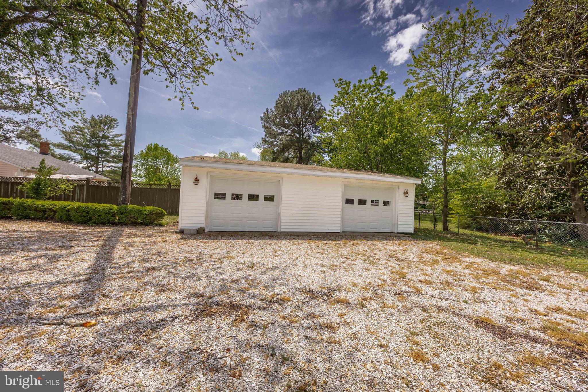 2712 Cinder Lane Quantico, MD 21856 - Photo 81 of 100 a view of a dry yard with trees in front of it