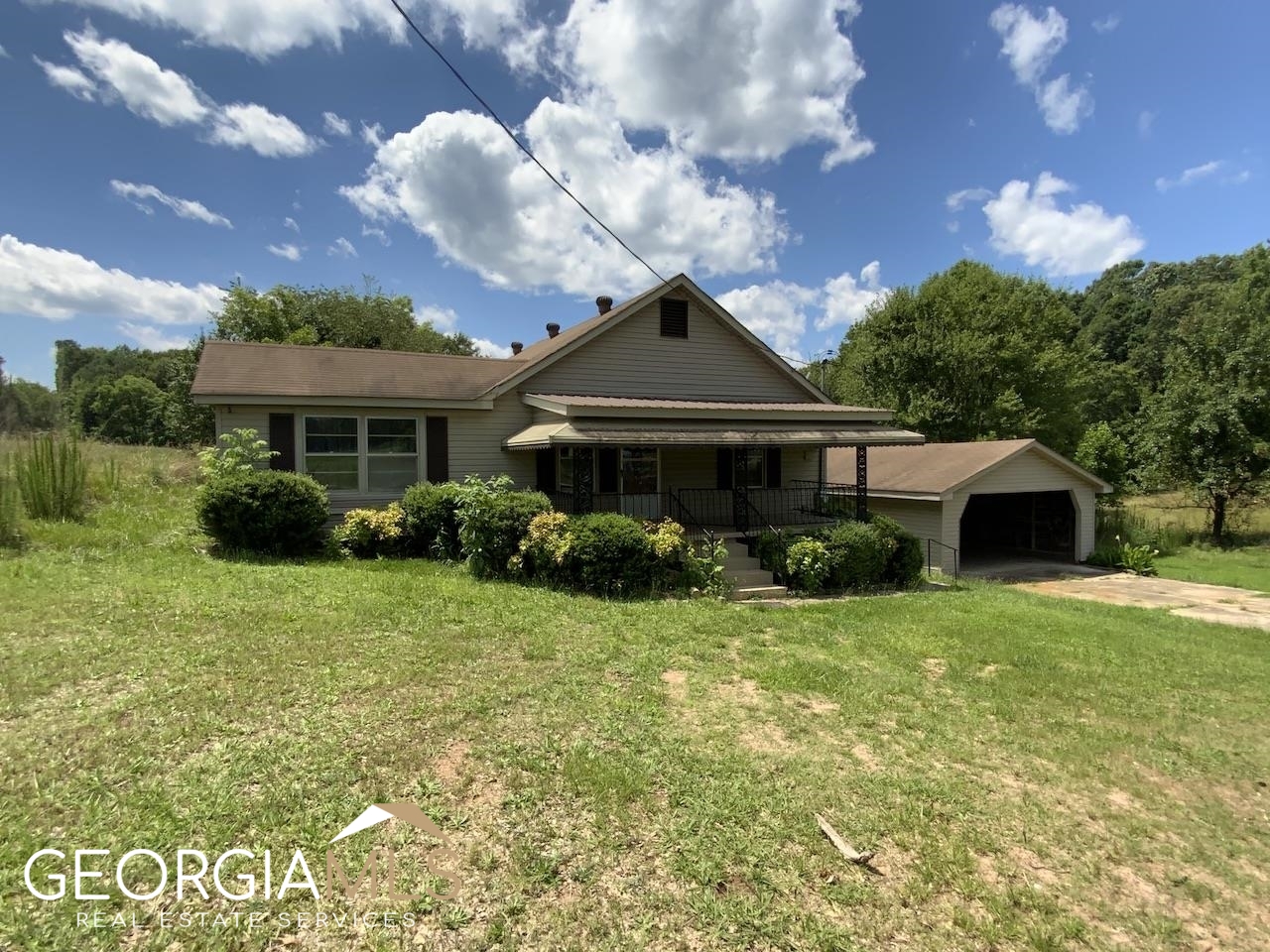 3625 Farmers Academy Road Carnesville, GA 30521 - Photo 1 of 1 a front view of a house with a yard