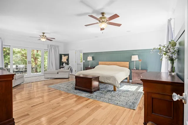 a view of entryway and hall with a living room