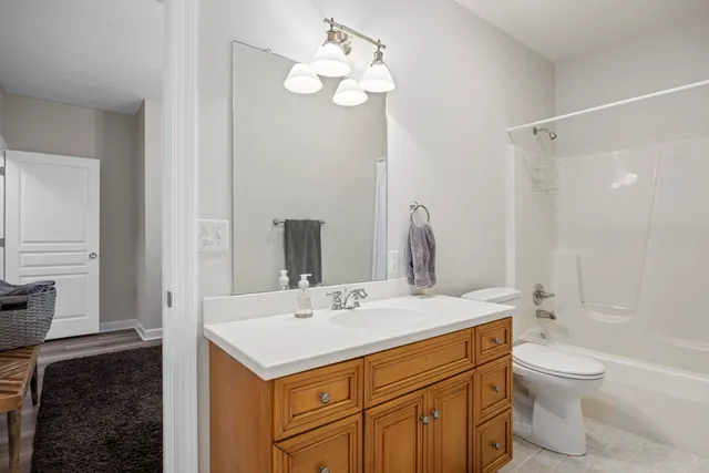 a view of a patio with a table and chairs