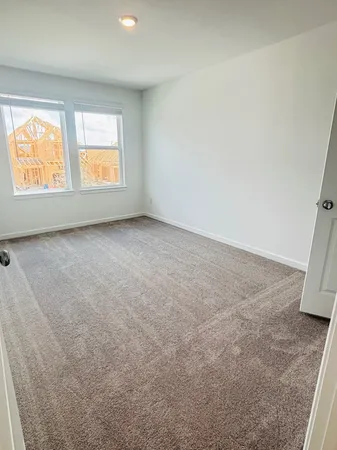 a room with a sink and a mirror