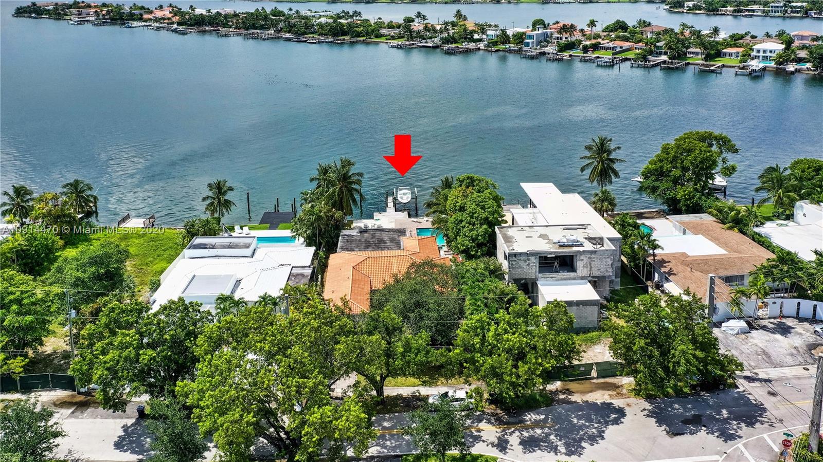 1205 North Biscayne Point Road Miami Beach, FL 33141 - Photo 3 of 12 an aerial view of a house with a lake view