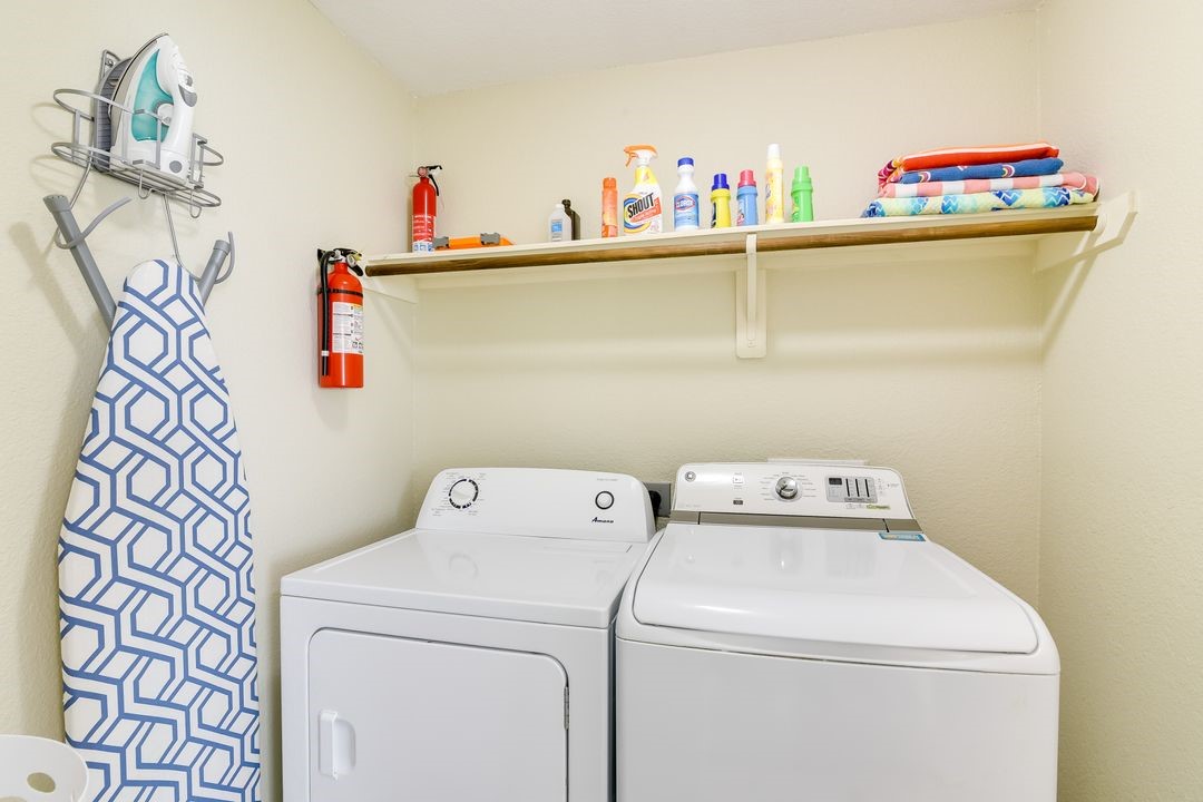 1206 4th Street Seabrook, TX 77586 - Photo 14 of 15 a utility room with dryer and washer
