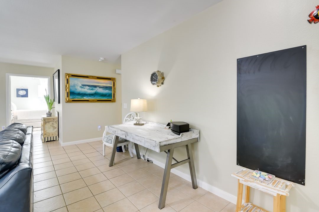 1206 4th Street Seabrook, TX 77586 - Photo 4 of 15 a workspace with furniture and window