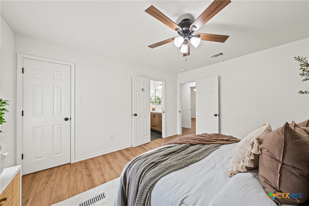34 Golden Poppy Loop Belton, TX 76513 - Photo 18 of 27 a bedroom with bed and ceiling fan