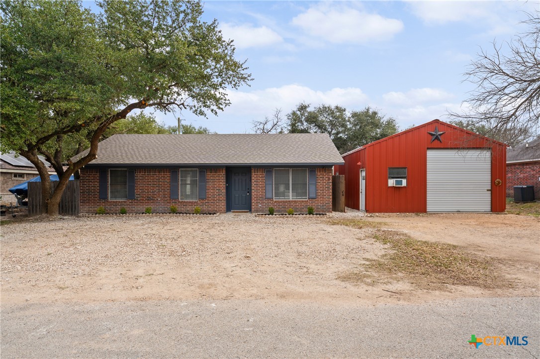 34 Golden Poppy Loop Belton, TX 76513 - Photo 2 of 27 a front view of a house with a yard and garage