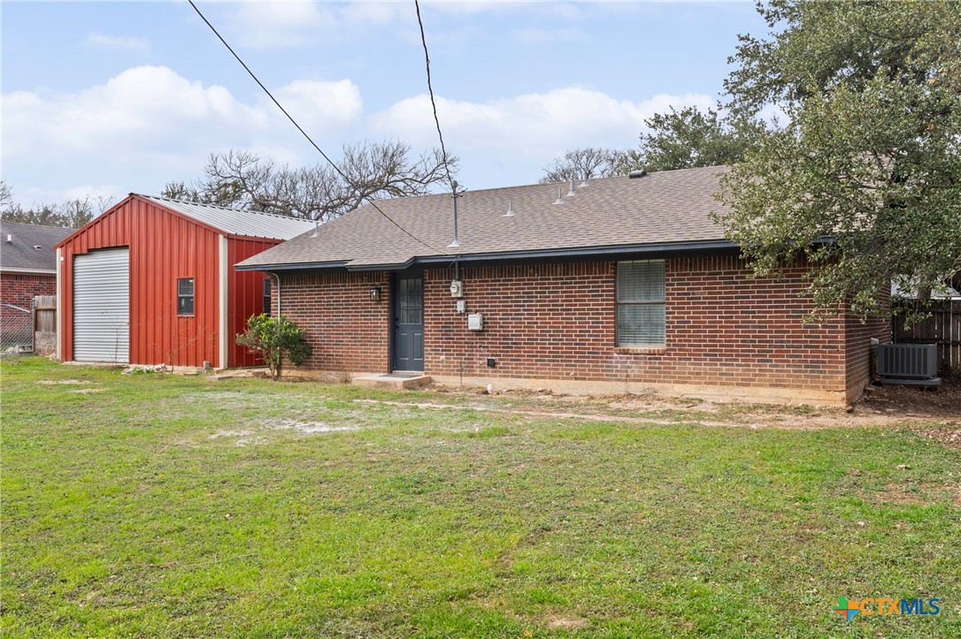 34 Golden Poppy Loop Belton, TX 76513 - Photo 22 of 27 a front view of house with yard