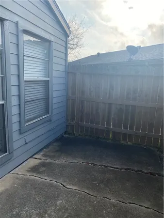 a view of storage and utility room with racks on the wall