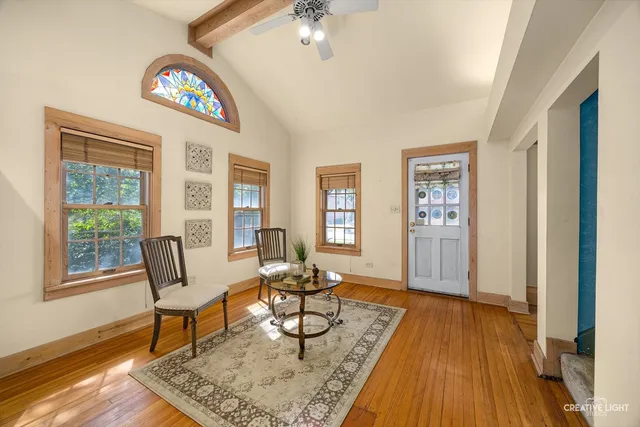 a living room with furniture and a table
