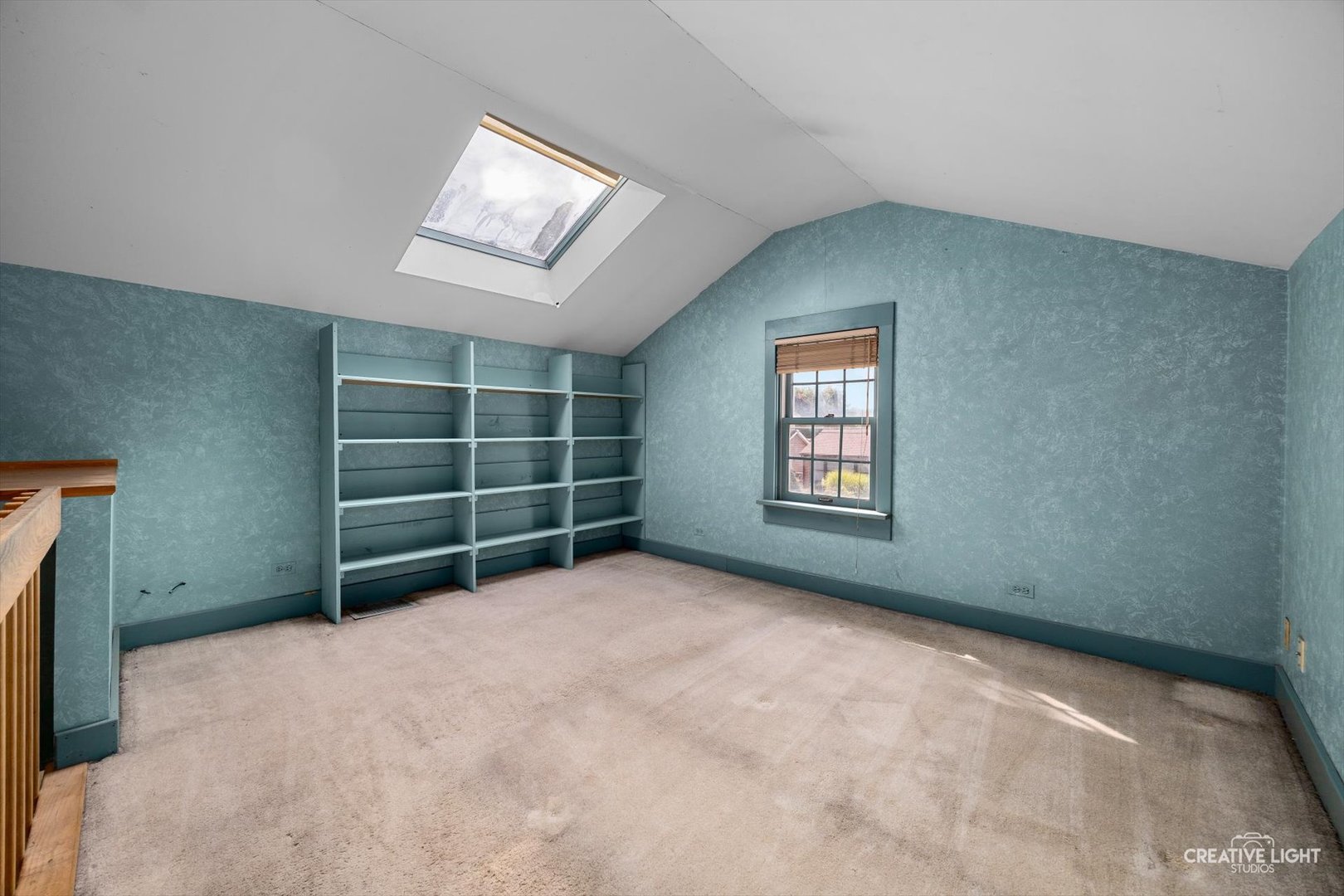 3S511 4th Street Warrenville, IL 60555 - Photo 8 of 36 an empty room with a window and a fireplace