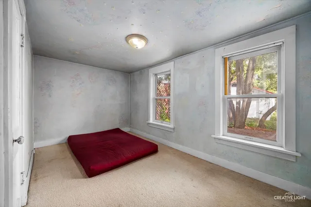 an empty room with windows